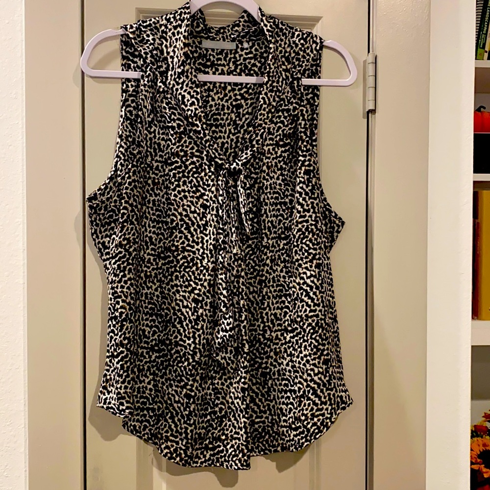 Animal print silky blouse with faux tie collar